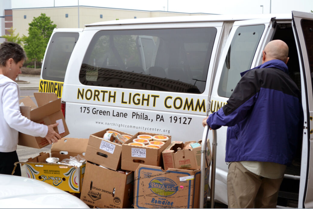 AROUND TOWN: Busy Days for the Food Cupboard at North Light Community Center